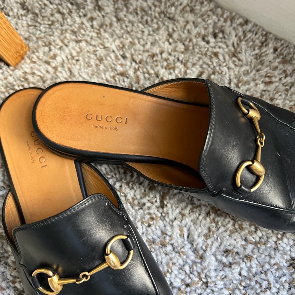 Gucci Women's Black Leather Mules with Gold Accents